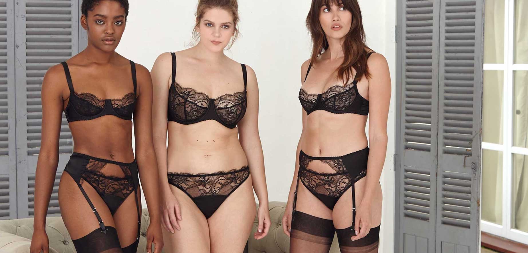 3 models wear luxury Fleur of England luxury lingerie sets in black lace 