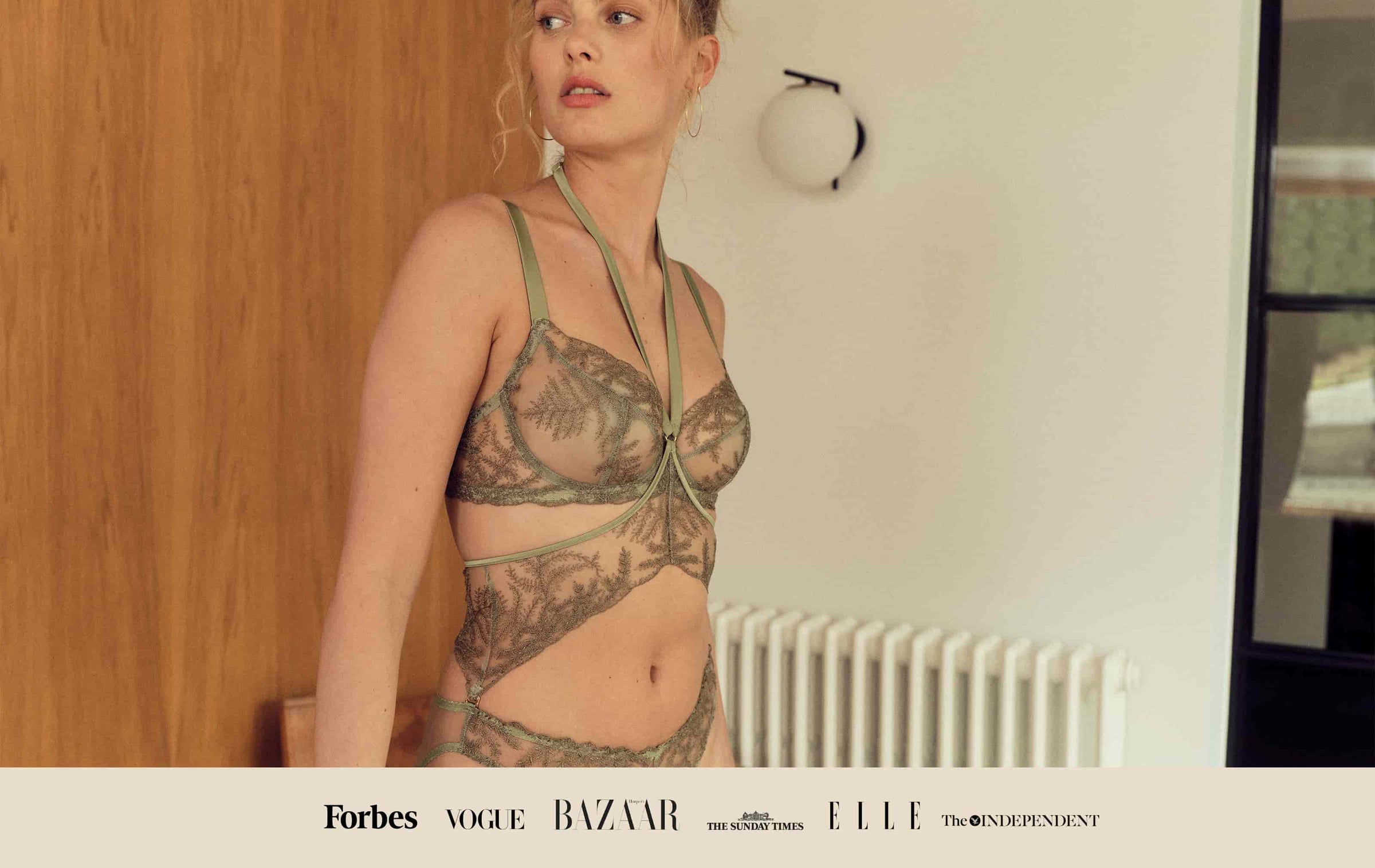 Model wears Fleur of England Luxury Lingerie Arianna Green Balcony Bra & Body Harness Set