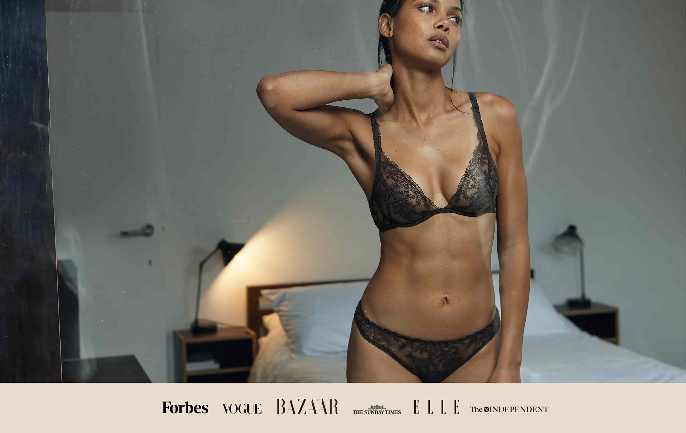 Model wears Fleur of England Luxury LIngerie Kyra Plunge Bra and Brief Brown Set