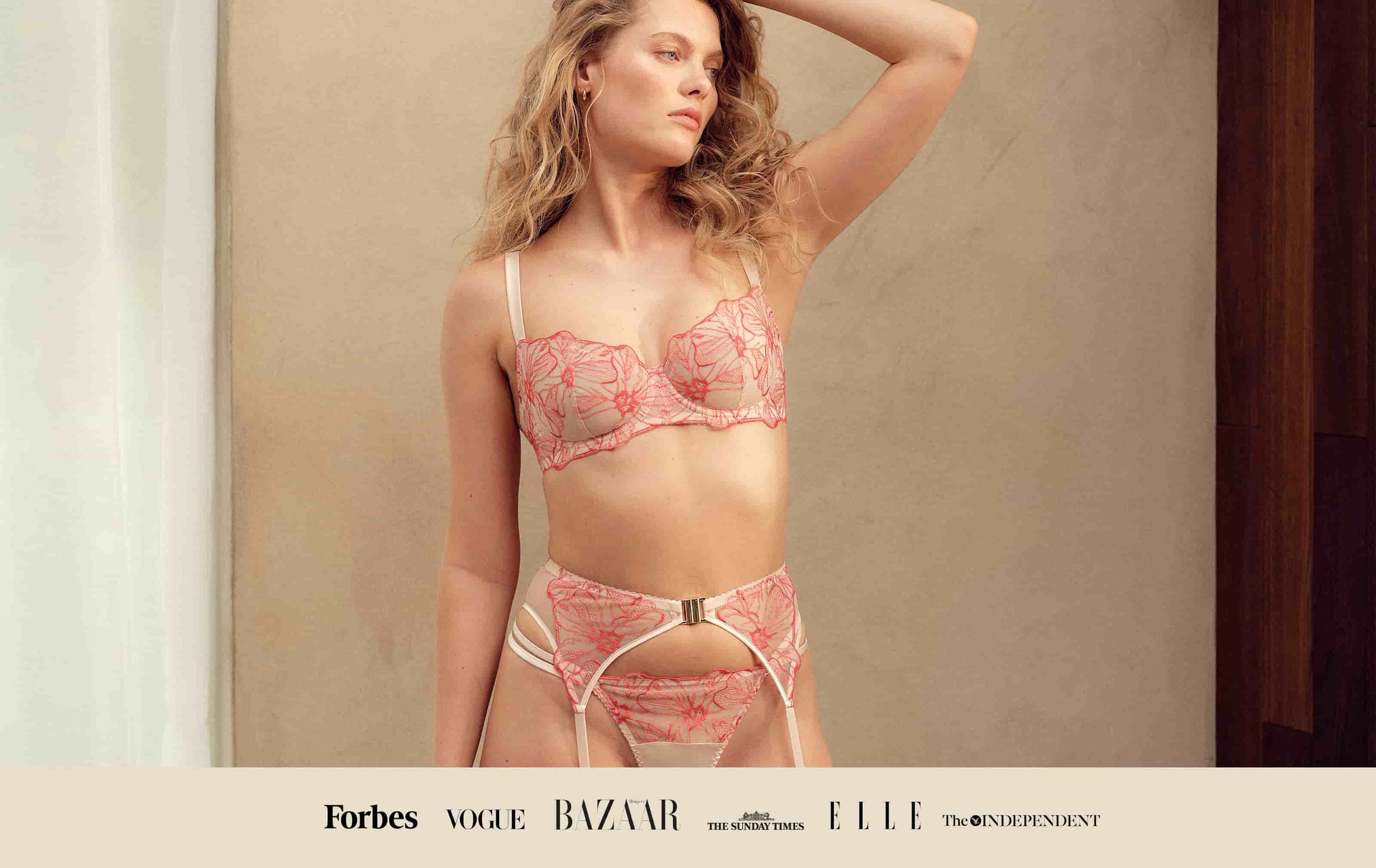 Model wears Fleur of England Luxury Lingerie Rosa Balcony Bra, Strap Thong and Suspender Belt