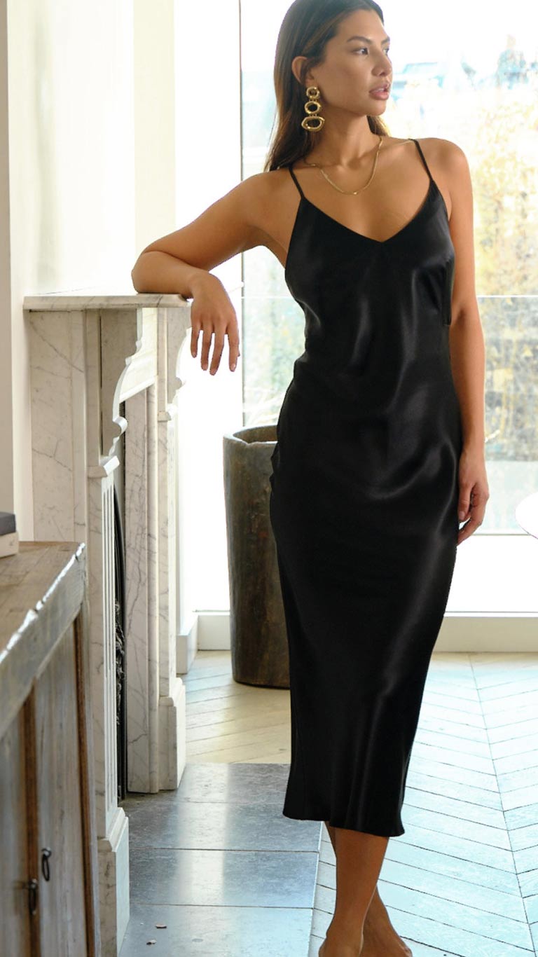 Fleur of England Luxury Lingerie, model wears Fleur Du Jour Slip dress in Black