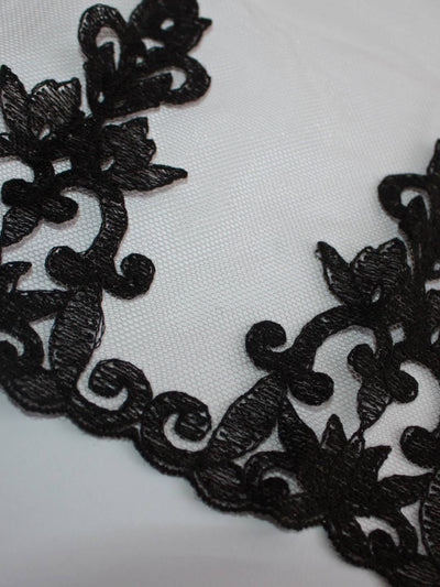 Close-up image of 'Onyx' Luxury embroidery with bold black details hand drawn by Fleur of England