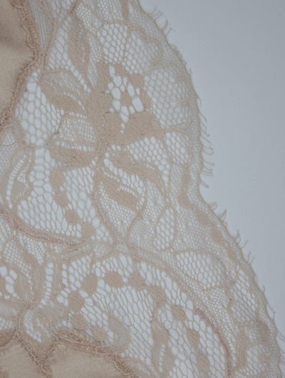 Close-up image of Blush luxury lace with floral detailing by Fleur of England