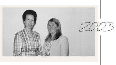 black and white picture of Fleur with Princess Anne in 2003